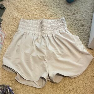 Nike Women's High Waist Light Gray Shorts (size small)